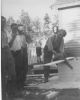 544 - Peter Bonia sawing wood